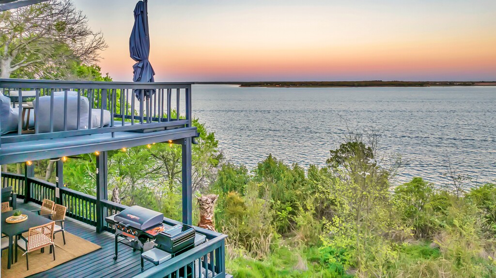Porch at sunset — one of three with a lake view