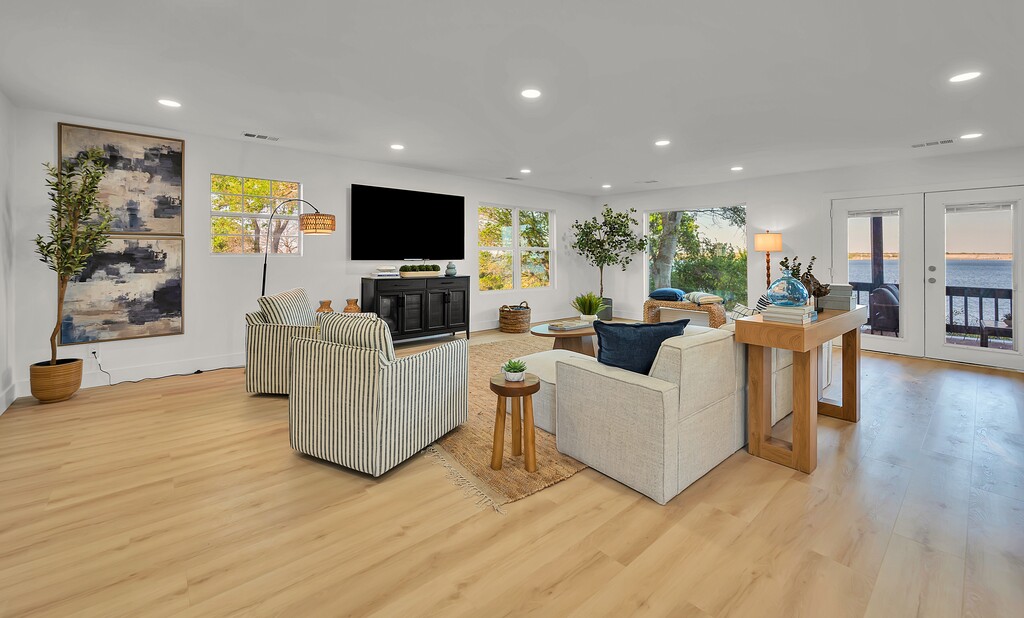 Living room — French doors open to the lake