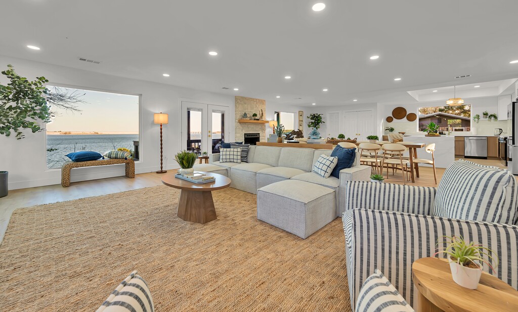 Oversized window framing the water