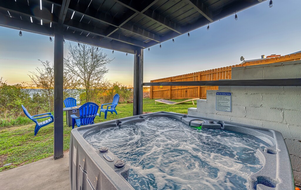 Hot tub at sunset with lake view