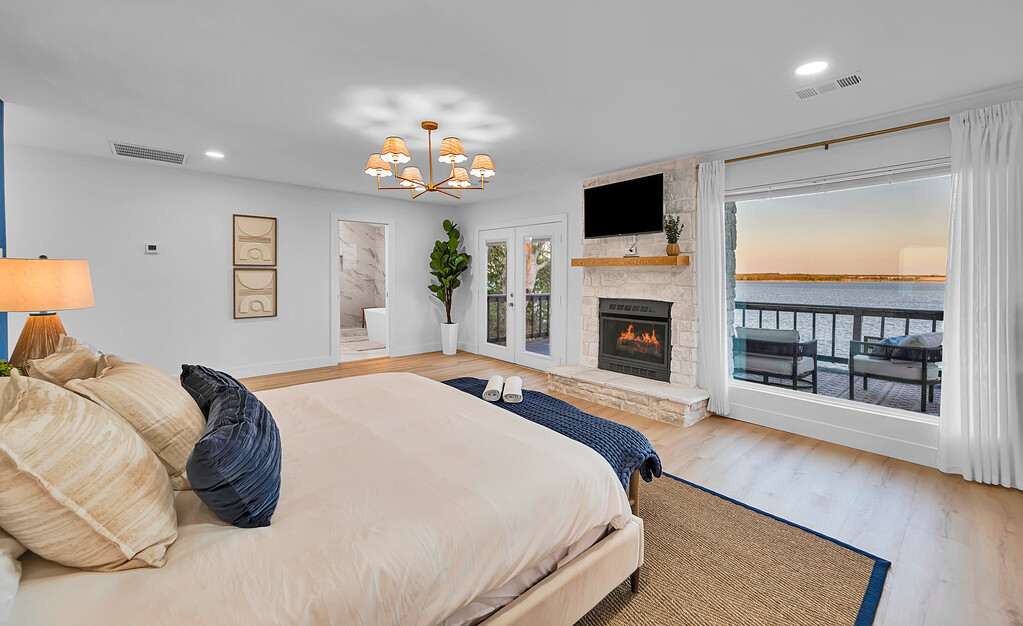 Master bedroom — French doors right onto the lake