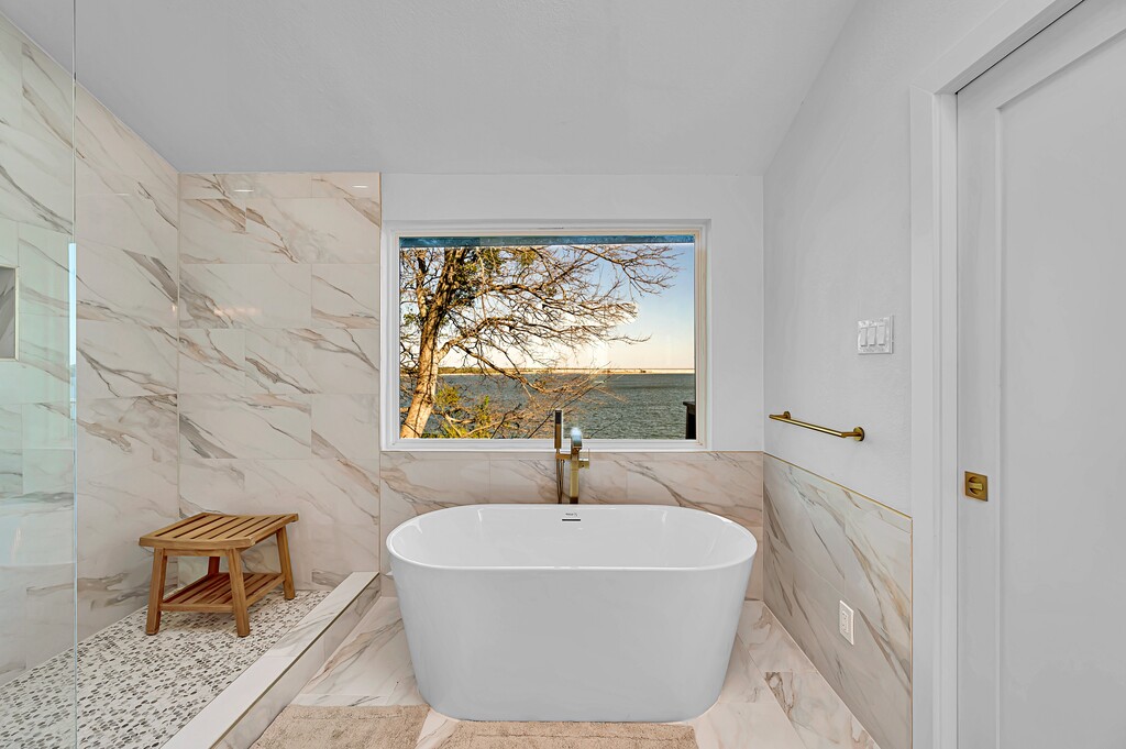 Master bath — soaking tub with direct lake view
