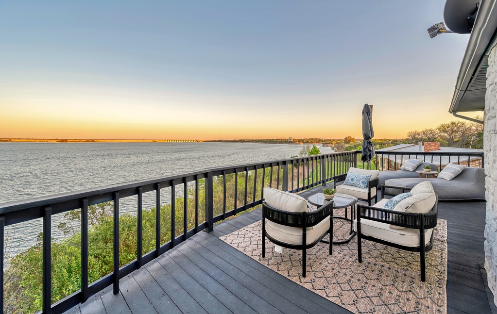 Upper deck at sunset — the dam on the horizon