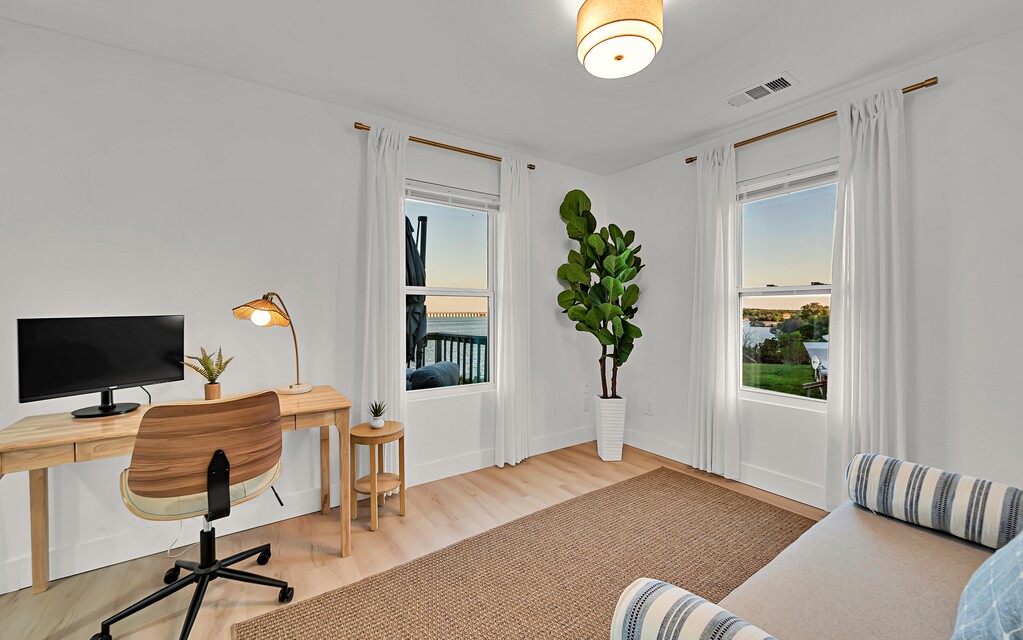 Guest bedroom — lake view at sunrise